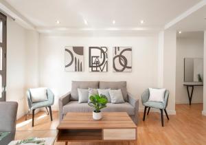 A seating area at Plaza Nueva HOMES