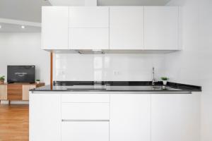 A kitchen or kitchenette at Plaza Nueva HOMES
