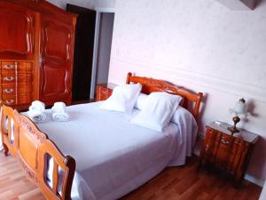 Postel nebo postele na pokoji v ubytování 25puntocinco alquiler x día con cochera Tandil