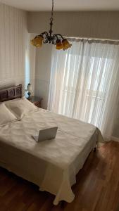 Postel nebo postele na pokoji v ubytování 25puntocinco alquiler x día con cochera Tandil