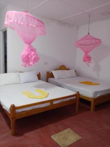 Postel nebo postele na pokoji v ubytování U new guest house
