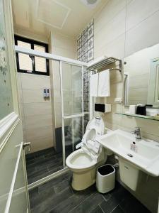 Een badkamer bij 金門禧樂民宿