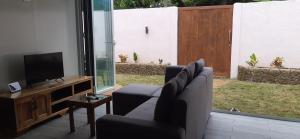 TV a/nebo společenská místnost v ubytování AM Residences