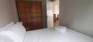 Postel nebo postele na pokoji v ubytování AM Residences