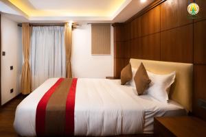 Hotel Kailash Kutee客房内的一张或多张床位