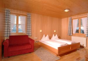 מיטה או מיטות בחדר ב-Haus Schatz