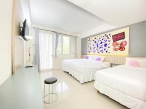 Lova arba lovos apgyvendinimo įstaigoje Transformer Center Hotel