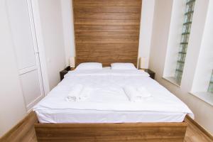 Postel nebo postele na pokoji v ubytování Victoria Inn Tbilisi