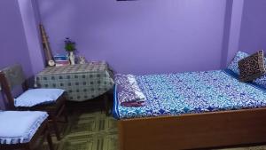 Postel nebo postele na pokoji v ubytování City View Home Stay
