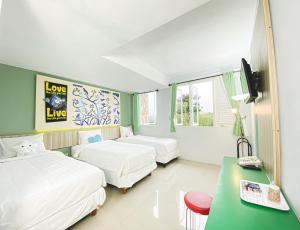 Lova arba lovos apgyvendinimo įstaigoje Transformer Center Hotel