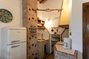 Kuchnia lub aneks kuchenny w obiekcie Agriturismo Poggio Salvi