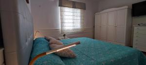 A bed or beds in a room at Villa yasleni