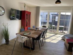 Μια τηλεόραση ή/και κέντρο ψυχαγωγίας στο Ferienhaus 15 "Gut Tossens"