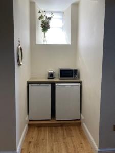 Fotografie z fotogalerie ubytování Kitchener Cottage Swanage very close to beach v destinaci Swanage + 23 fotografií