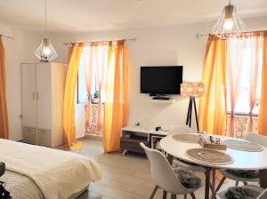TV a/nebo společenská místnost v ubytování Apartments & Rooms As + 25 fotografií