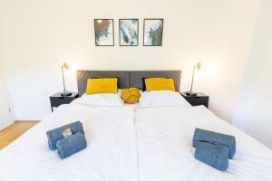 Säng eller sängar i ett rum på Lahn-Living III - modernes und helles Apartment mit Top Ausstattung