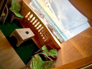 an overhead view of a living room with a table at شقة بأطلالة علي الشاطئ in Alexandria