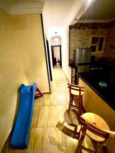a living room with a blue inflatable at شقة بأطلالة علي الشاطئ in Alexandria