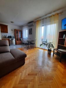 TV a/nebo společenská místnost v ubytování AriaDeMar