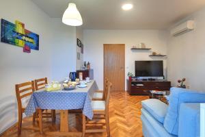 TV o dispositivi per l'intrattenimento presso Apartments Lidija