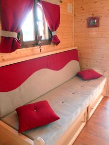 Postel nebo postele na pokoji v ubytování Camping de la Treille