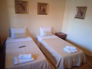 Posteľ alebo postele v izbe v ubytovaní Thiamis Guesthouse