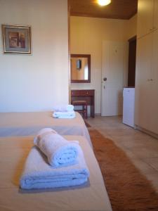 Posteľ alebo postele v izbe v ubytovaní Thiamis Guesthouse