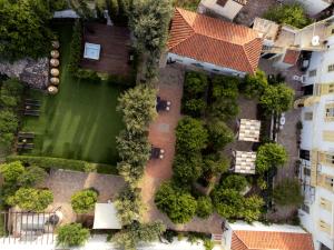 an aerial view of a building with a garden at Rafalias Mansion in Hydra