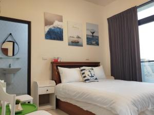 Cama o camas de una habitación en Pier 10