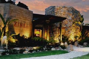 a building with a sign that reads jumeirah at Tsala Treetop Lodge in Plettenberg Bay +54 photos