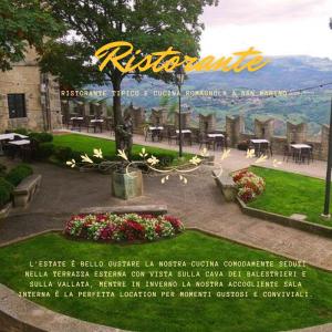 un folleto para un restaurante con una foto de un parque en Hotel Bellavista, en San Marino