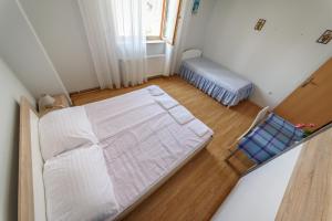 Posteľ alebo postele v izbe v ubytovaní Šoda