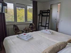 Postel nebo postele na pokoji v ubytování Bed&Bubbels 256