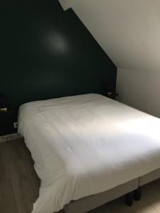 Postel nebo postele na pokoji v ubytování Gîte La Fontaine