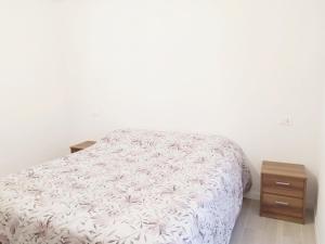 Posteľ alebo postele v izbe v ubytovaní Levico Al Corso Apartments
