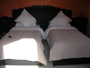 Postel nebo postele na pokoji v ubytování Hotel Safa