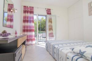 Posteľ alebo postele v izbe v ubytovaní Apartment Kirby