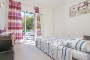Posteľ alebo postele v izbe v ubytovaní Apartment Kirby
