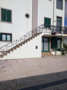 a staircase on the side of a building at Francelos Village in Vila Nova de Gaia