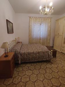 Katil atau katil-katil dalam bilik di Appartamento relax con giardino