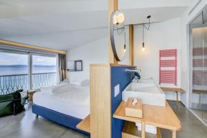 Voodi või voodid majutusasutuse Hotel Flaminia toas
