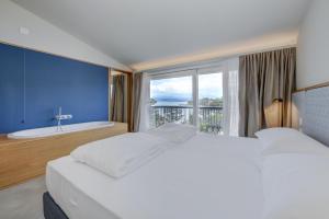 Voodi või voodid majutusasutuse Hotel Flaminia toas