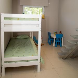 Rúm í herbergi á casa tibella