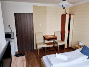 Voodi või voodid majutusasutuse Ubytovani-prostejov toas