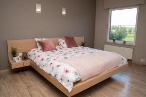Posteľ alebo postele v izbe v ubytovaní casa tibella