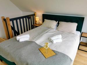 Кровать или кровати в номере Piaski i Trawy