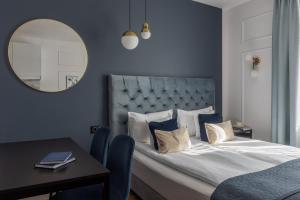Postel nebo postele na pokoji v ubytování WILLA MAGNOLIA - Apartamenty i Pokoje - ROWERY, POKÓJ ZABAW, KAWA Z EKSPRESU