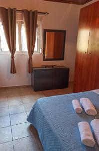 Posteľ alebo postele v izbe v ubytovaní Casa Georgia