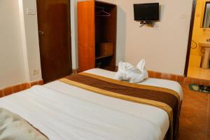 Letto o letti in una camera di Hotel ThorongLa Thamel