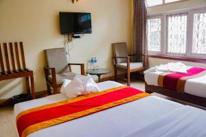 Letto o letti in una camera di Hotel ThorongLa Thamel